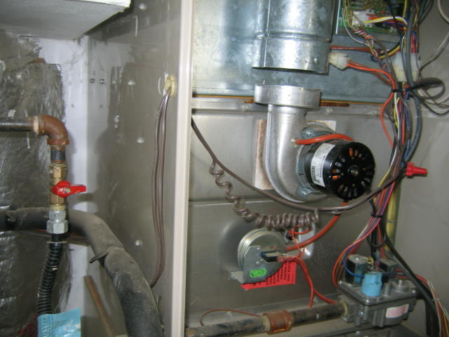 Home inspection reveals disconnected flue pipe in furnace cabinet